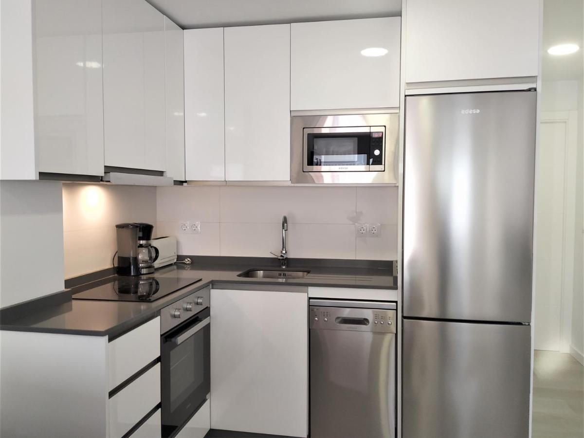 1 Bedroom Beachfront Apartment At Torecilla Beach 内尔哈 外观 照片